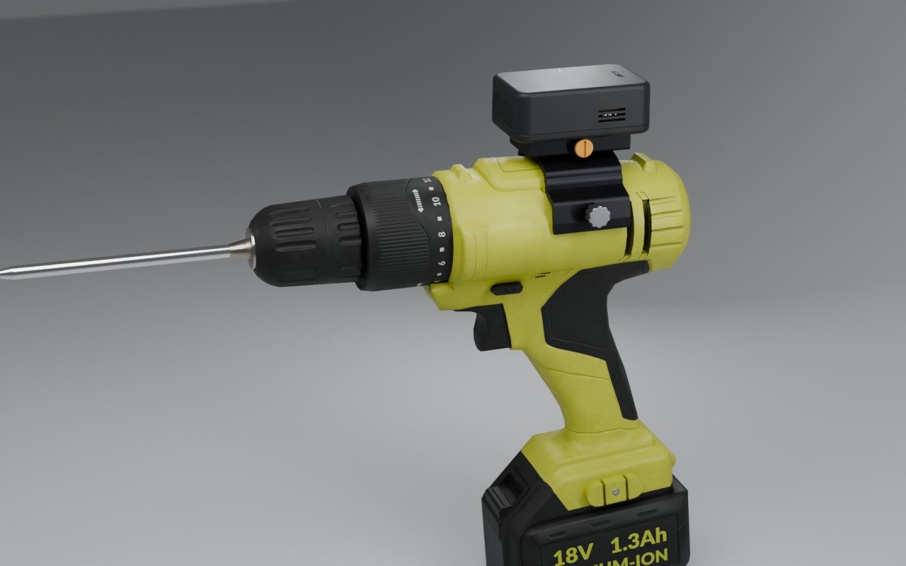 A cordless drill with the ToolSense sensor clipped on top, on a light grey studio backdrop